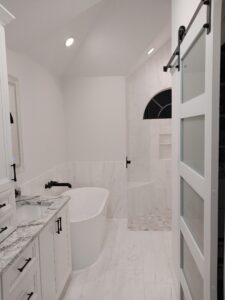 "Bathroom tile installation by Paul’s Masterpiece Tile."
